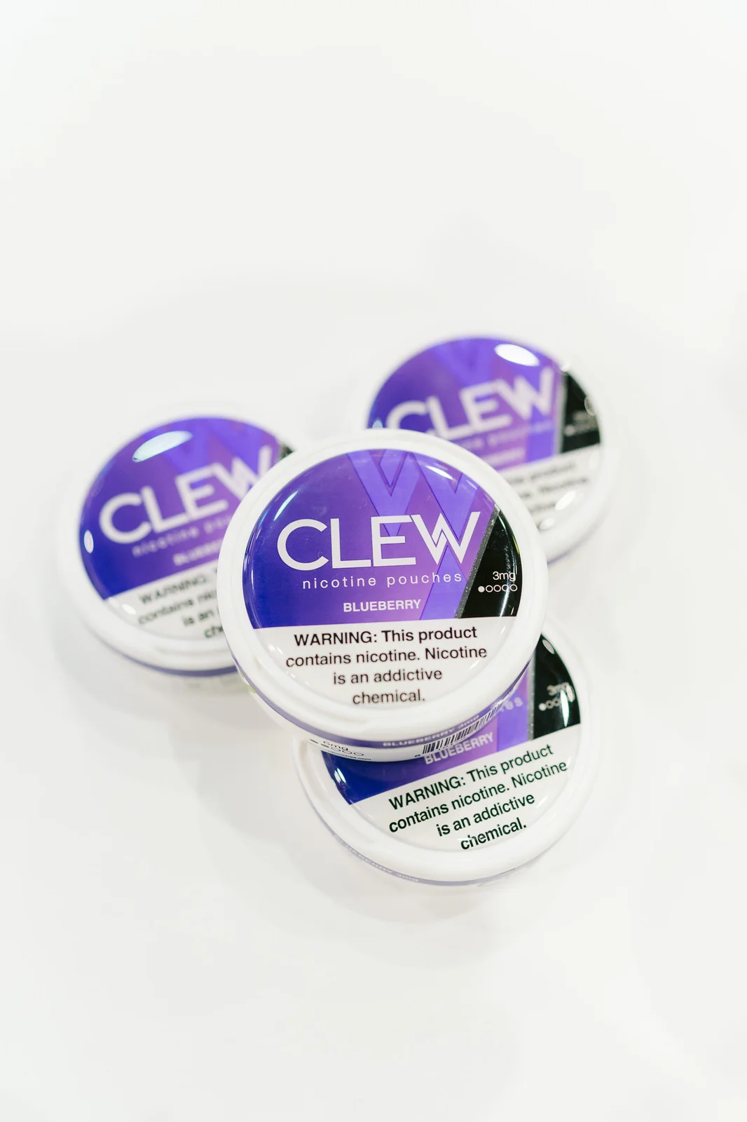 Clew World Vaper Show 2025 — producto latas tarjetas